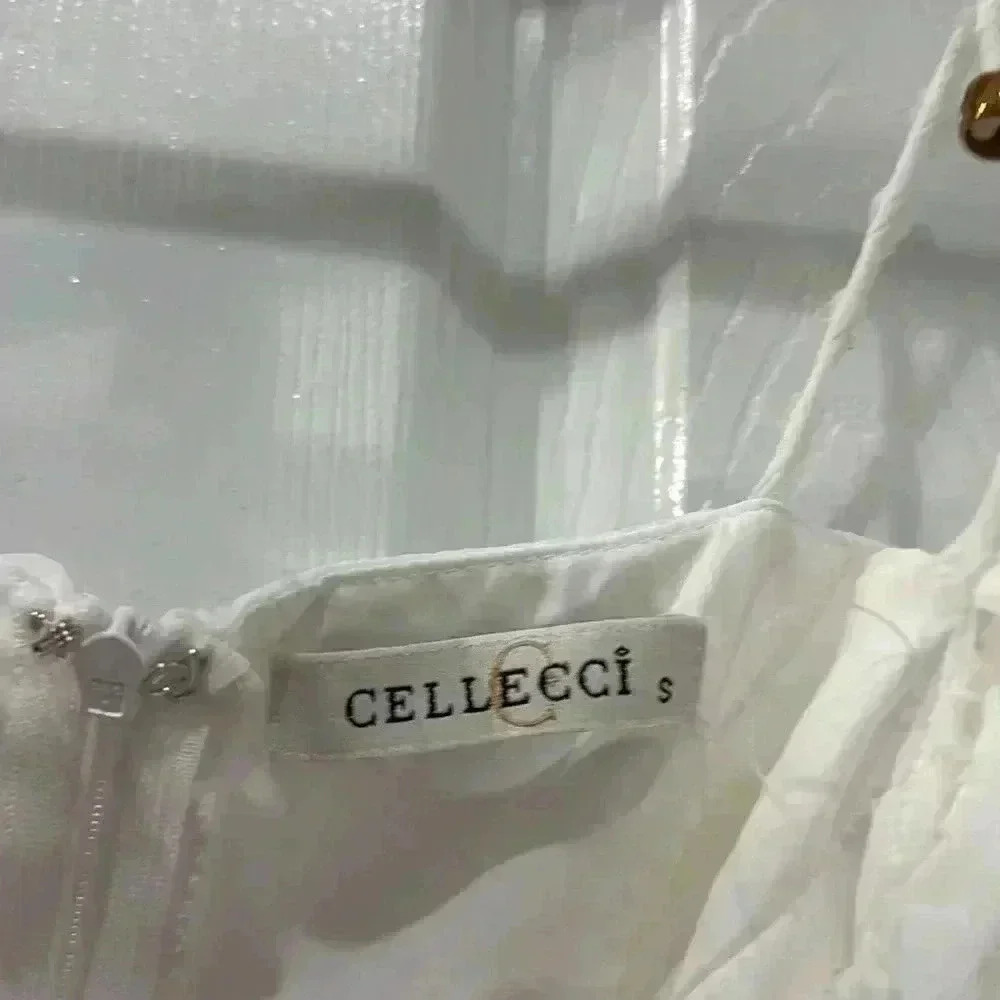 CELECCI DAYLIGHT STRING-TIE SHOULDER FLOUNCE ROMPER WHITE - Picture 7 of 7